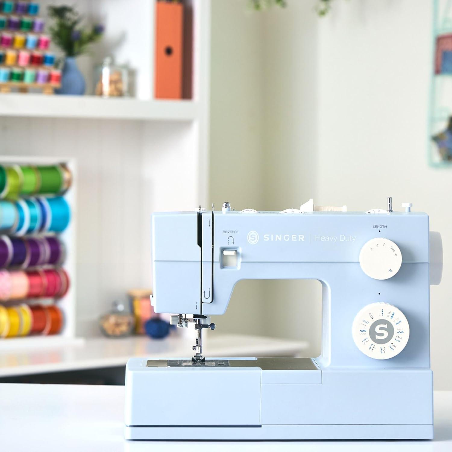 imageSINGER Heavy Duty 4423 High Speed Sewing Machine with Accessory Kit  Strong Motor With Enhanced Piercing Power 97 Stitch Applications Full Metal frame 1step Buttonhole ampamp LED Light4423 Meltwater Blue
