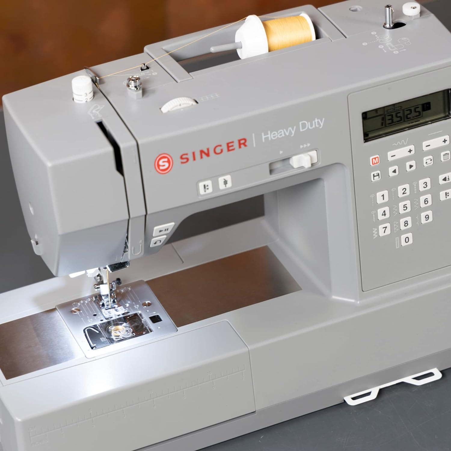 imageSINGER Heavy Duty 6700C Computerized Sewing Machine with Accessory Kit  Strong Motor with Enhanced Piercing Power 411 Stitch Applications LCD Screen Full Metal frame ampamp 1step Buttonhole