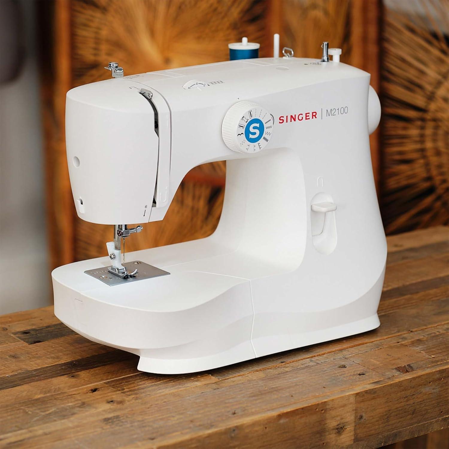 imageSINGER M2100 Lightweight ampamp Compact Sewing Machine With 63 Stitch Applications LED Light ampamp Easy 4step Buttonhole  Ideal for Mending and Sewing