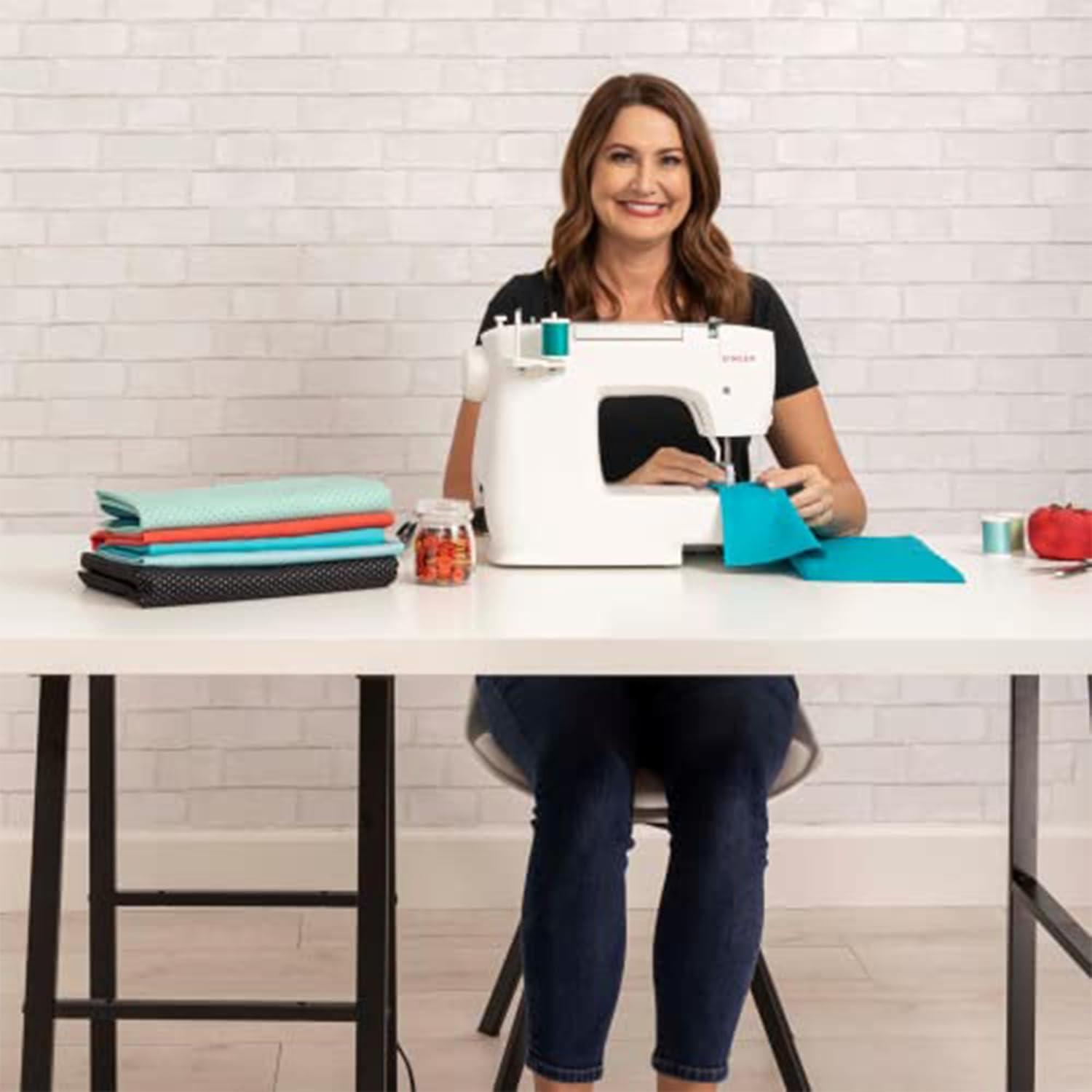 imageSINGER M2100 Lightweight ampamp Compact Sewing Machine With 63 Stitch Applications LED Light ampamp Easy 4step Buttonhole  Ideal for Mending and Sewing