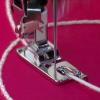 imageSINGER  Narrow Rolled Hem Foot for LowShank Sewing Machines 18 Inch Hem Light to Medium Weight Fabrics Couch Over Narrow Cord  Sewing Made Easy